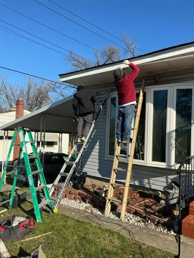 Restoration crew performing exterior repair in Racine